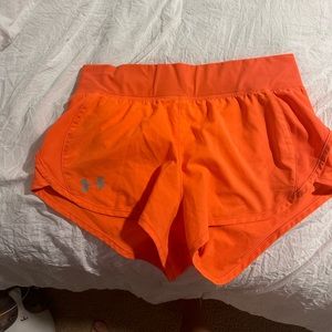 Under armor shorts. Size small. Orange.